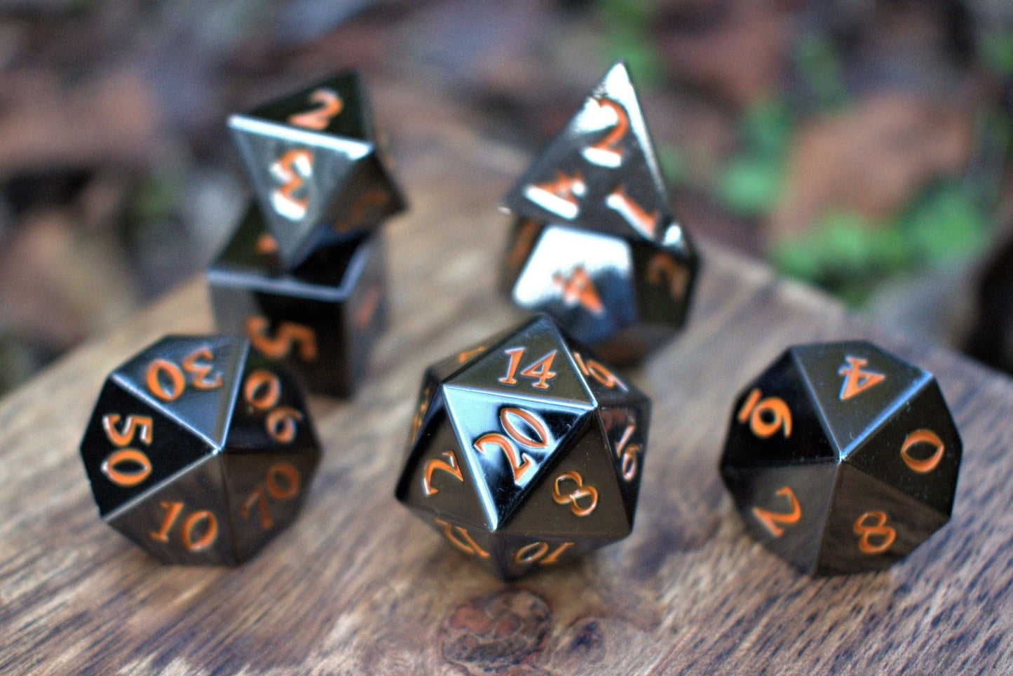 Black and Orange Sharp-Edged Metal Dice Set